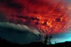 A cloud of ash pours from Puyehue volcano in southern Chile, at sunset on June 5, 2011. (Claudio Santana/AFP/Getty Images)